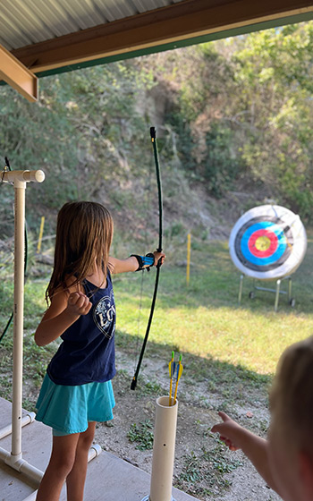 Girl shooting a bow